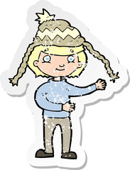 retro distressed sticker of a cartoon man wearing winter hat