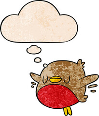 cartoon christmas robin and thought bubble in grunge texture pattern style