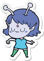 sticker of a cartoon alien girl