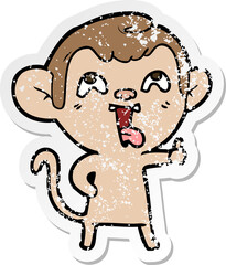 distressed sticker of a crazy cartoon monkey