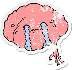 distressed sticker of a cartoon brain with headache