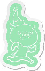 happy cartoon  sticker of a pig running wearing santa hat