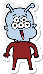 sticker of a happy cartoon alien
