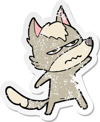distressed sticker of a cartoon annoyed wolf
