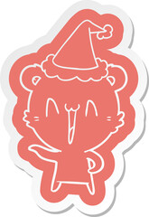 laughing polar bear cartoon  sticker of a wearing santa hat