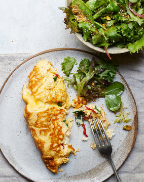 Delicious omelette with green salad