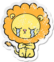 distressed sticker of a crying cartoon lion