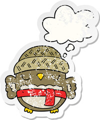 cute cartoon owl in hat and thought bubble as a distressed worn sticker