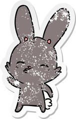 distressed sticker of a curious bunny cartoon