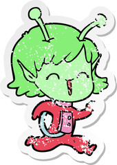 distressed sticker of a cartoon alien girl laughing