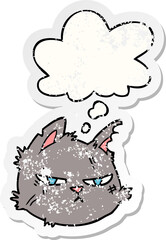 cartoon tough cat face and thought bubble as a distressed worn sticker