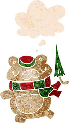 cartoon bear with umbrella and thought bubble in retro textured style