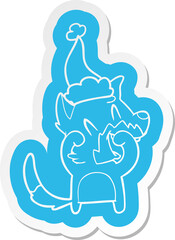 laughing fox cartoon  sticker of a wearing santa hat
