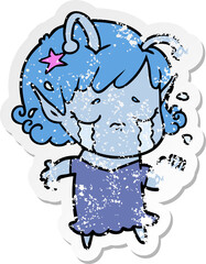 distressed sticker of a cartoon crying alien girl