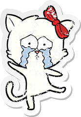 distressed sticker of a cartoon cat