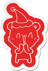 happy bear cartoon  sticker of a wearing santa hat