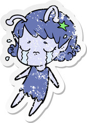 distressed sticker of a cartoon crying alien girl