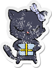 distressed sticker of a cute cartoon cat with bow