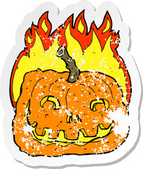 retro distressed sticker of a cartoon burning pumpkin