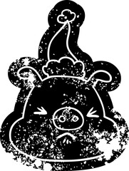 cartoon distressed icon of a angry pig face wearing santa hat
