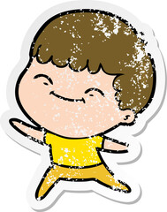 distressed sticker of a cartoon happy boy