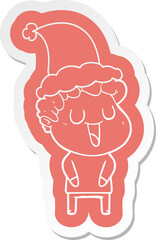 laughing cartoon  sticker of a man wearing santa hat