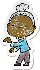 distressed sticker of a cartoon peaceful old woman