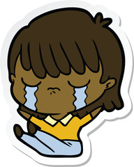 sticker of a cartoon woman crying
