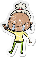 distressed sticker of a cartoon crying old lady