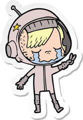 sticker of a cartoon crying astronaut girl