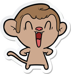 sticker of a cartoon laughing monkey