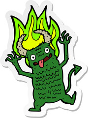 sticker of a cartoon demon