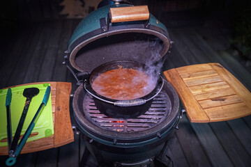 ready to eat - goulash from venison meat, from a chamois -  cooked in a dutch oven on a charcoal...