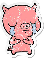 distressed sticker of a cartoon pig crying
