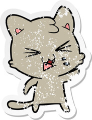 distressed sticker of a cartoon hissing cat