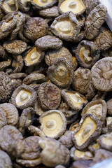 Dried shiitake mushrooms food background.