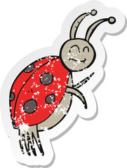 retro distressed sticker of a cartoon ladybug