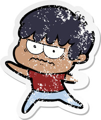 distressed sticker of a annoyed cartoon boy