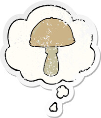cartoon mushroom and thought bubble as a distressed worn sticker