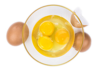 Some Raw Eggs isolated on white (selective focus).