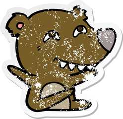distressed sticker of a cartoon bear showing teeth