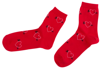 A pair of red socks with a pattern of many hearts, as if walking, on a white background, isolate