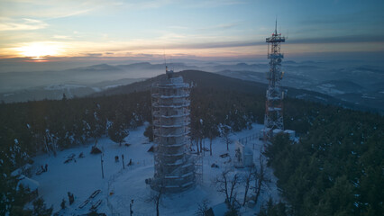 Aerial view of Wielka Sowa (Great Owl) during sunset - highest peak of the Owl Mountains in Central...