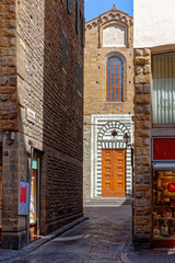 Fototapeta na wymiar Ornamental doorway to the Santo Stefano al Ponte church in Florence