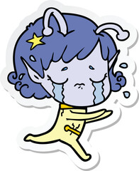 sticker of a cartoon crying alien girl