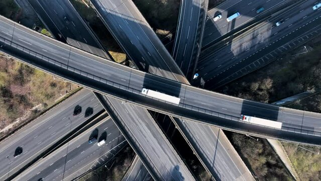 M1 and M25 UK Motorway Interchange Rush Hour Aerial View