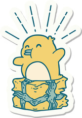 sticker of tattoo style penguin sitting on present