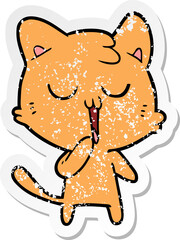 distressed sticker of a cartoon cat yawning