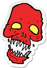 sticker of a cartoon scary skull