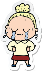 sticker of a cartoon crying old lady